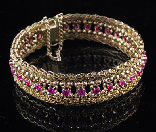 A Middle Eastern 18ct gold and ruby bracelet,